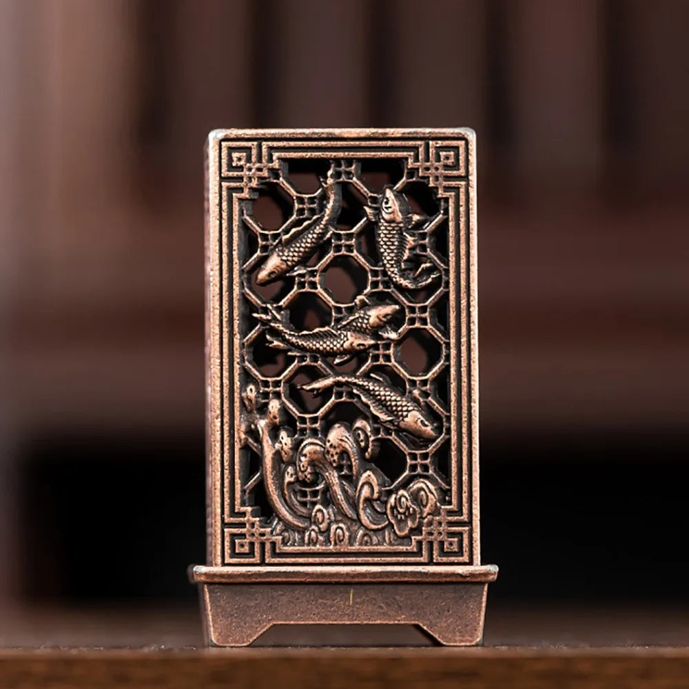 Zinc vertical incense holder with dragon relief in carved lattice frame, antique bronze