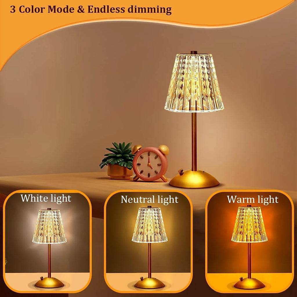 Champagne gold lamp with faceted crystal-look shade on round gold base