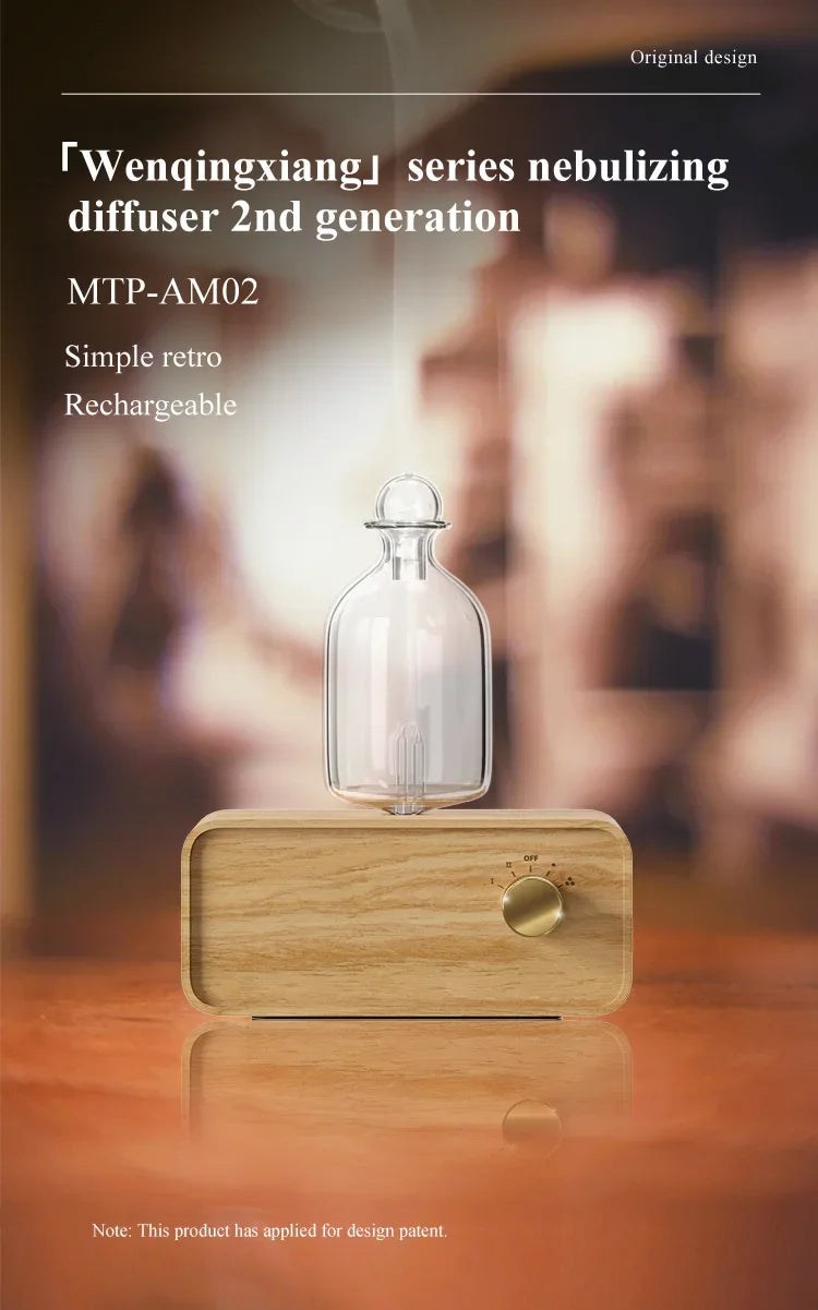 Essential oil diffuser with clear glass bottle and light wood base, brass knob and side profile