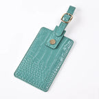 Forest Green passport cover with top strap loop and gold-tone round snap