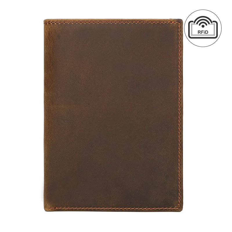 Cognac brown compact travel document wallet, front view with RFID label in corner.
