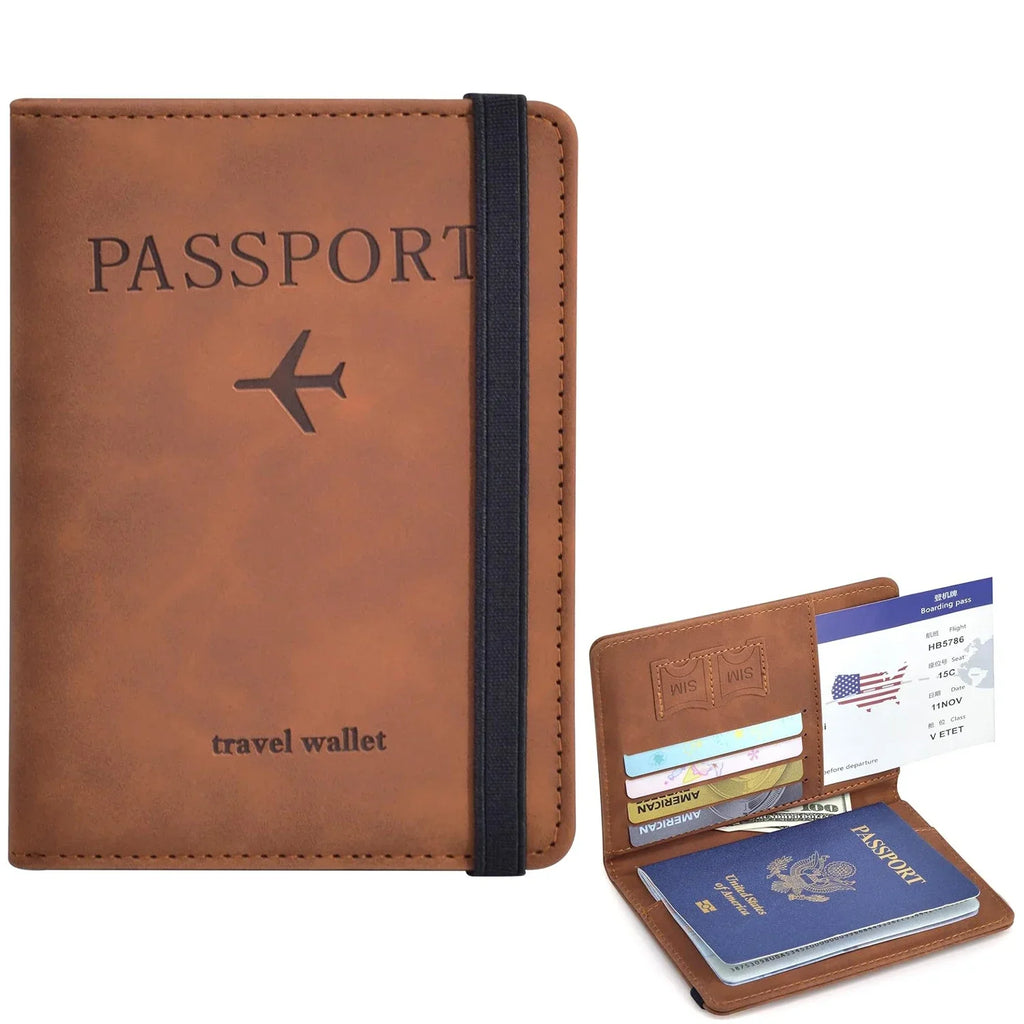 Cognac brown passport wallet with airplane emblem and navy elastic strap, RFID-style design