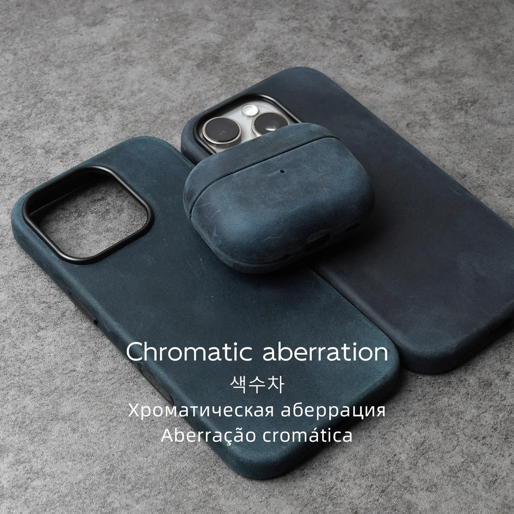 Dark blue leather AirPods case with open face and side port cutouts