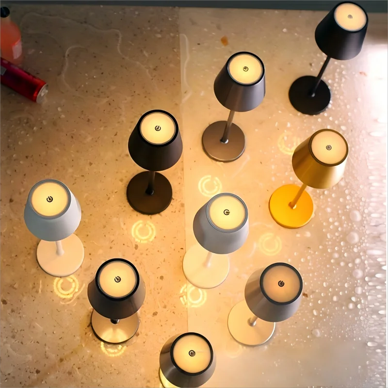 Wireless touch table lamps in multiple finishes with circular bases and black shades