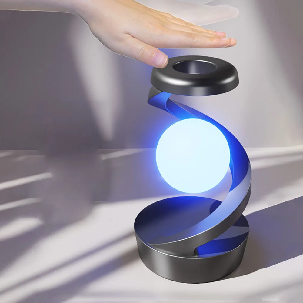 Hand-touched RGB wireless charging lamp with blue glow, white orb, and dark base