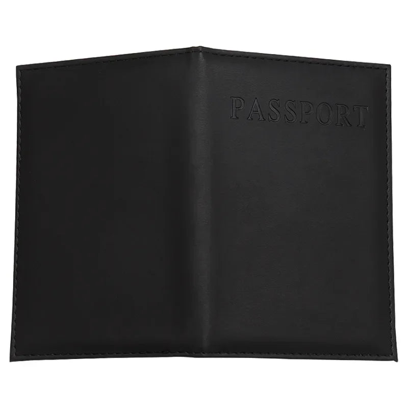 Black passport sleeve with embossed “PASSPORT” on the front panel and contrast stitching