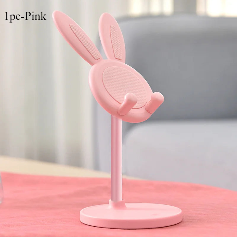 Blush pink rabbit lift phone stand with upright ears, circular mesh face, and round base