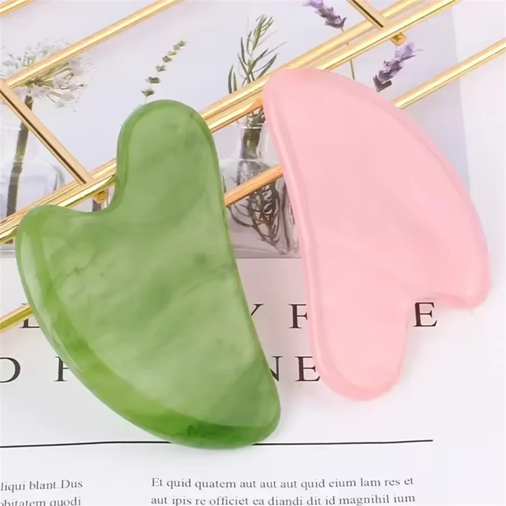 Green and rose quartz gua sha stones, curved heart-shaped tools