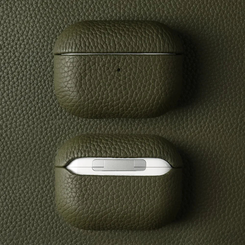 Emerald sage handmade leather AirPods case with AirPods showing
