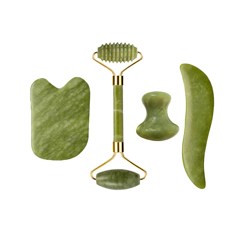 Nephrite jade roller set with ribbed scraper head, cupped gua sha and small massage stone