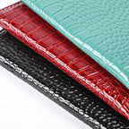 Close-up of croc-texture vegan leather: Burgundy, Forest Green, and Midnight Black