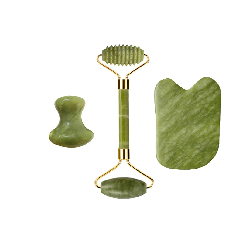 Jade massage tools set: ribbed roller, curved gua sha, and rounded facial stone