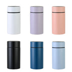 Petite smart thermos in assorted colors, smooth cylindrical body with black rim lid