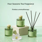 Reed diffuser set with four 50ml bottles and rattan reeds, tea fragrance theme
