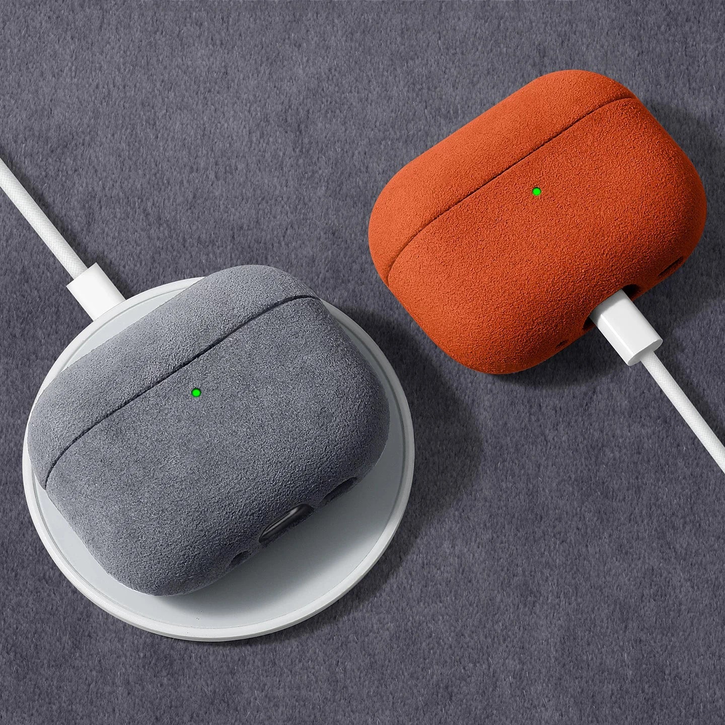 Amber orange Alcantara AirPods case closed; rounded suede shell with side cutouts