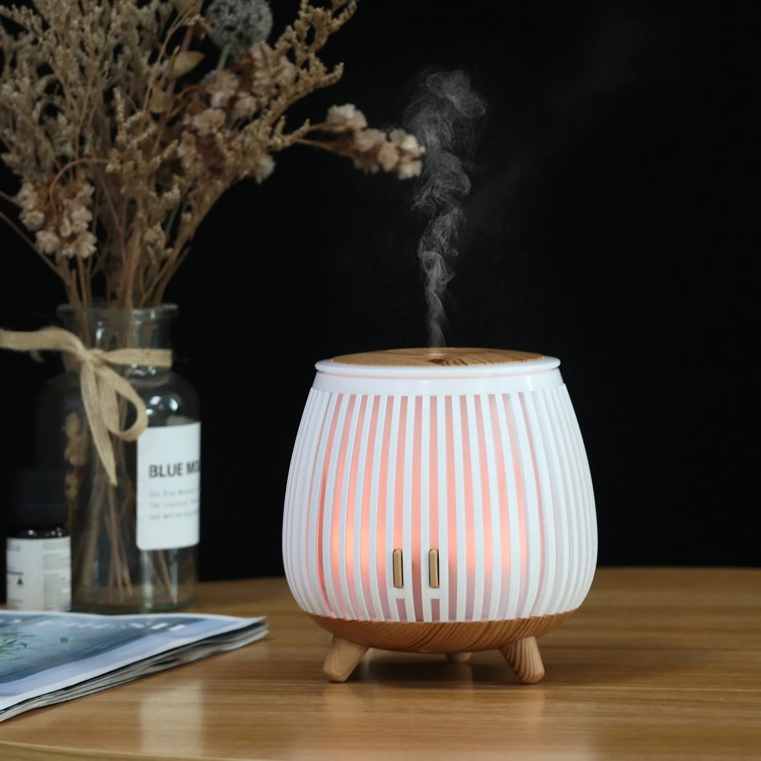 White striped aroma diffuser humidifier with warm mist and wood top