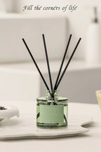 50ml reed diffuser bottle with rattan reeds, green glass and white label