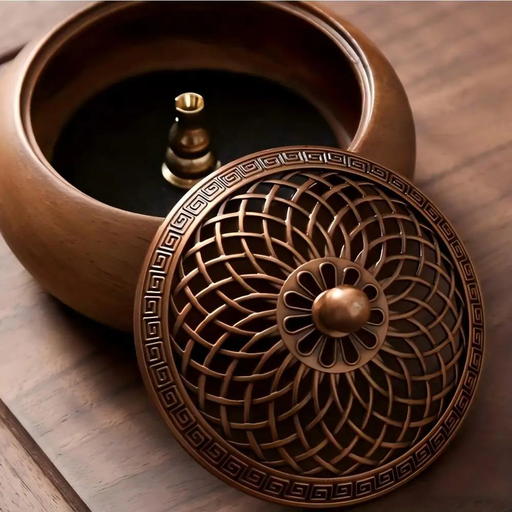 Round solid wood incense tray with metal lid and base insert visible from above