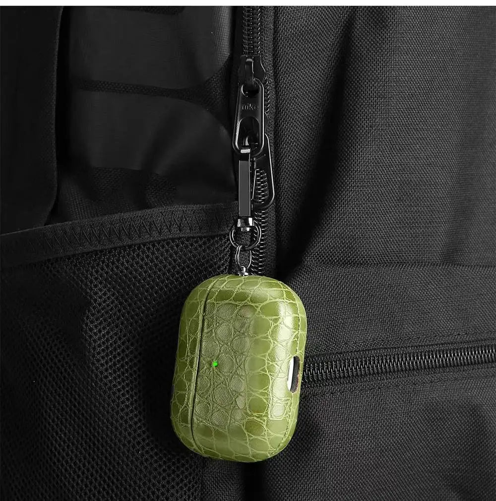 Olive green crocodile-grain AirPods case with keyring clip