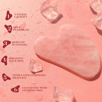 Pink gua sha heart tool and small roller pieces on textured surface