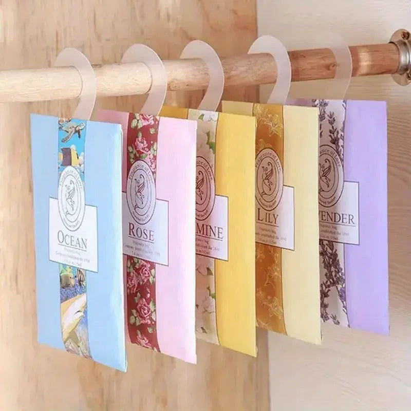 The Wardrobe & Car hanging sachet set, mix scents on white hangers