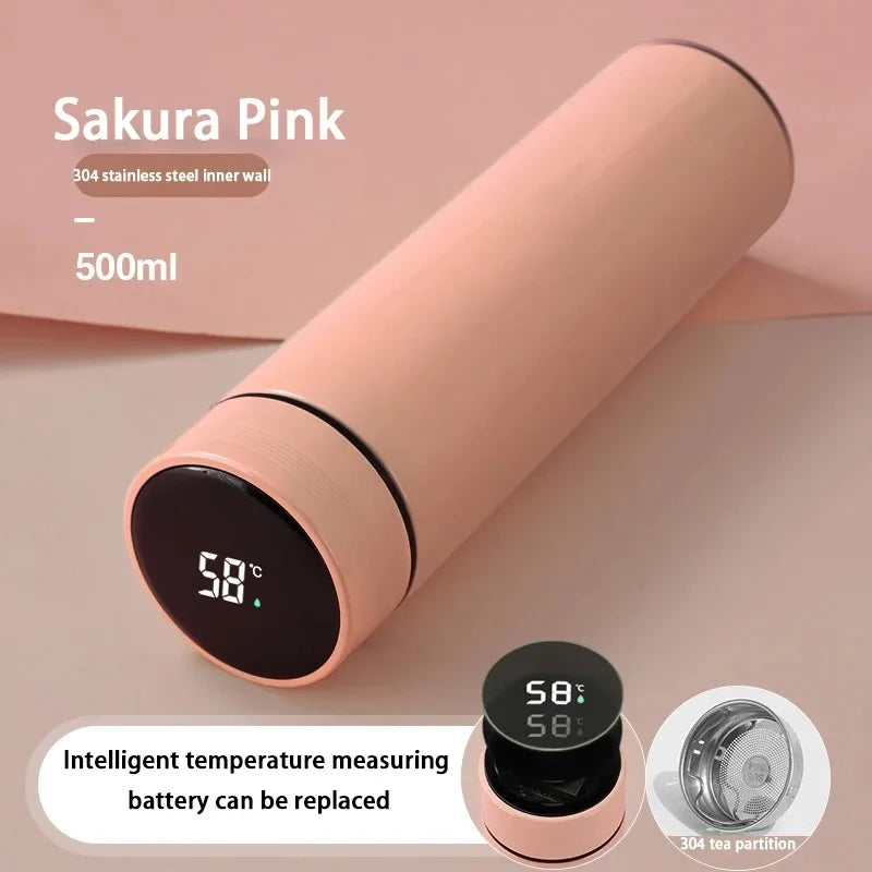 Light pink smart thermos with digital temperature display and tea infuser accessory