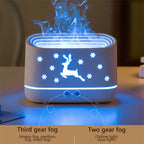 Ivory white elk diffuser with blue light ring; deer silhouette and snowflake pattern on front