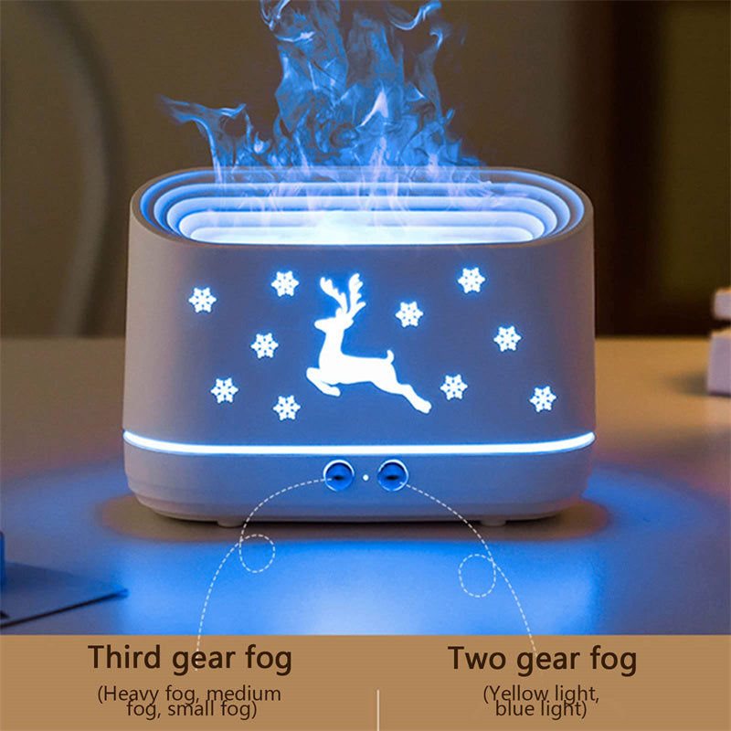 Ivory white elk diffuser with blue light ring; deer silhouette and snowflake pattern on front