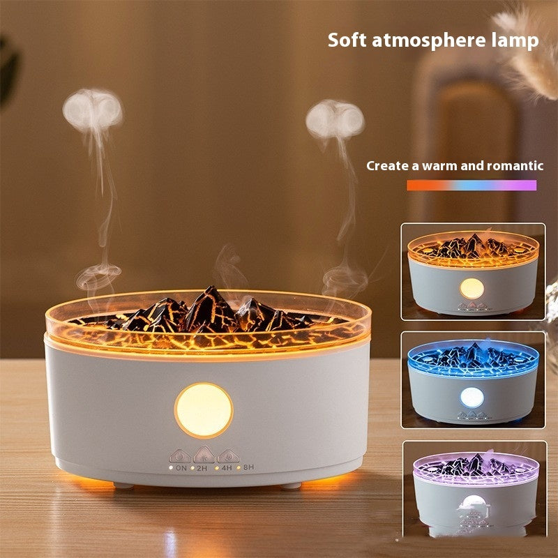 White volcano aroma diffuser with warm glow light and smoke rising over rocks