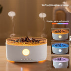 White volcano aroma diffuser with warm glow light and smoke rising over rocks