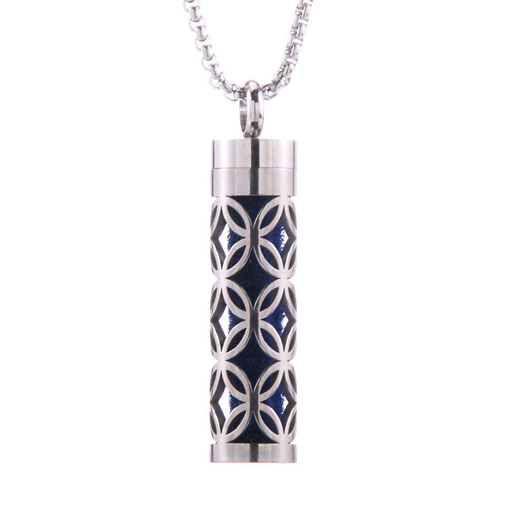 Aroma pendant cylinder with navy blue lattice-style cutouts and silver-tone chain