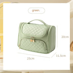 Fresh green vanity bag with quilted lid and front zip pouch, gold-tone zipper pulls
