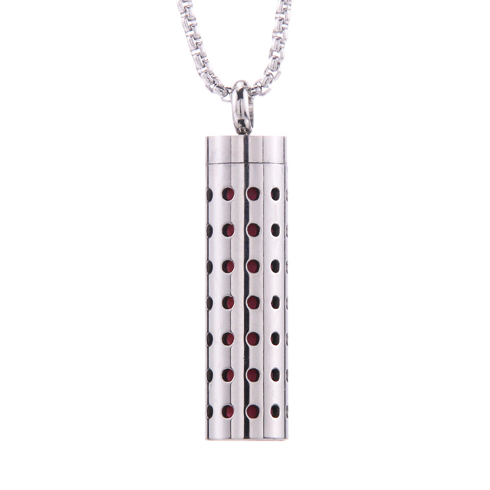 Aroma pendant, silver cylinder with red and black dot pattern
