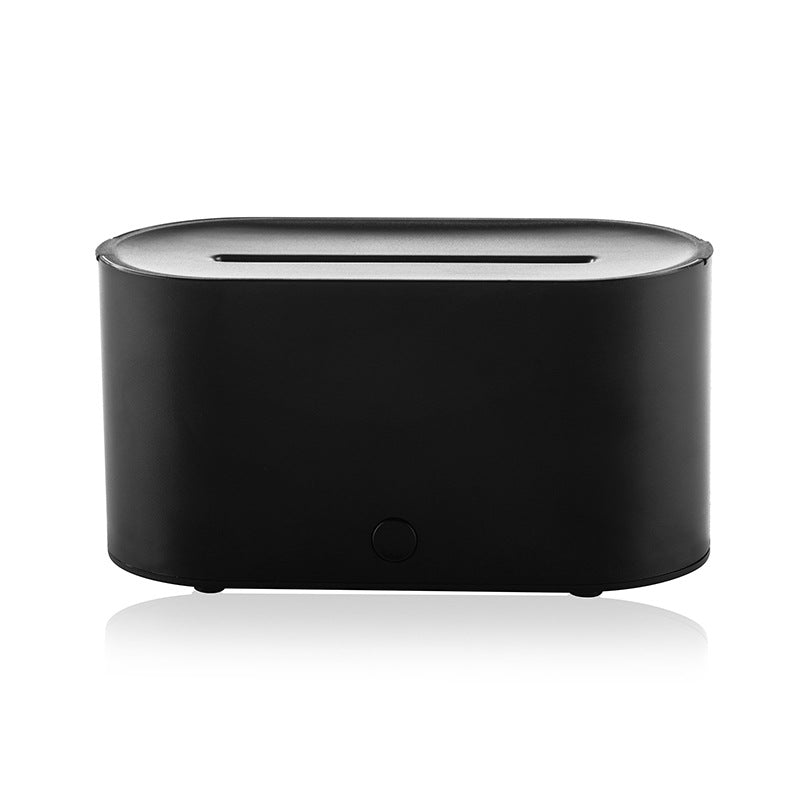 Black humidifier with round body, top slot, and small power button on front