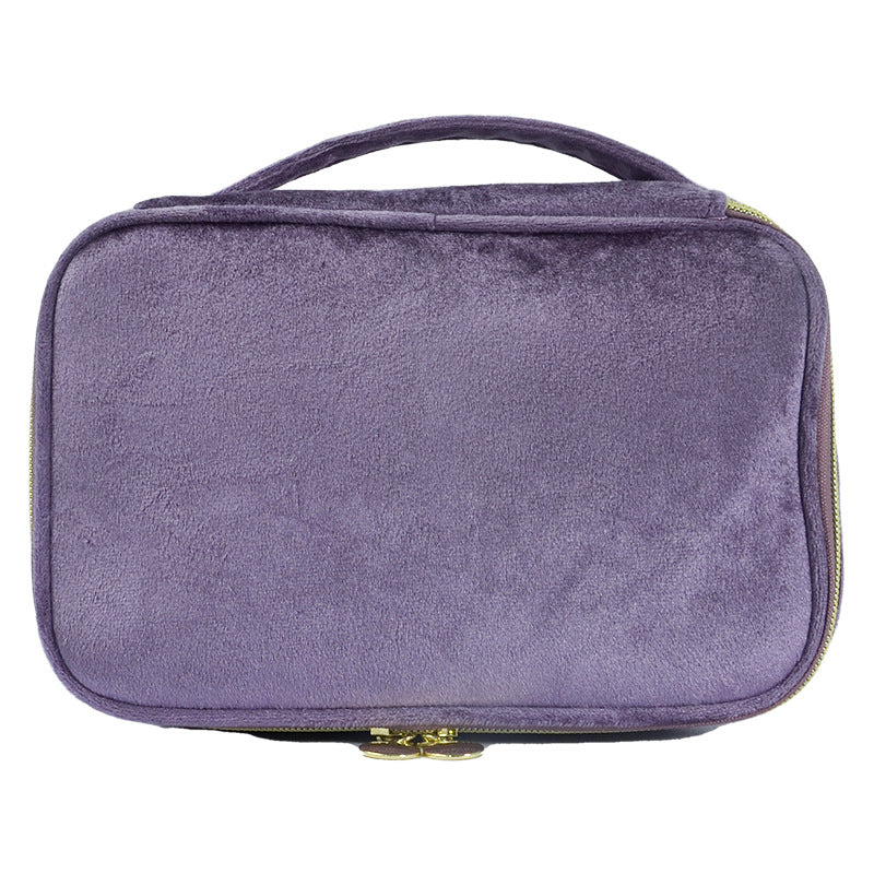 Purple soft travel cosmetic case with top handle and zip closure