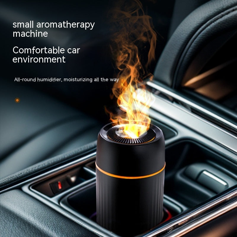 Black car aroma diffuser on air vent, emitting vapor plume.