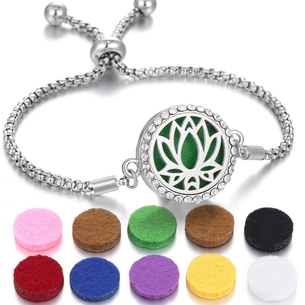 Silver Tree of Life aroma bracelet with green medallion center and colorful felt scent pads