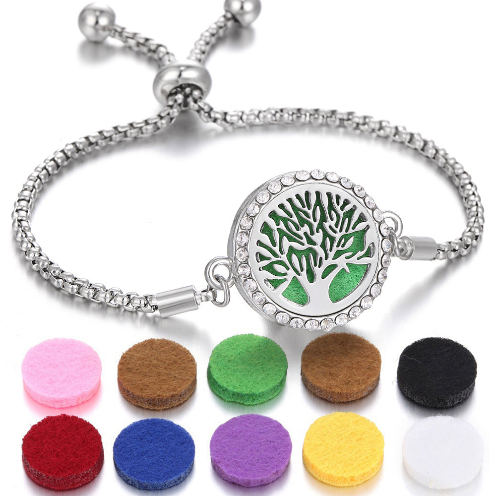 Silver Tree of Life aroma bracelet with green medallion center and colorful felt scent pads
