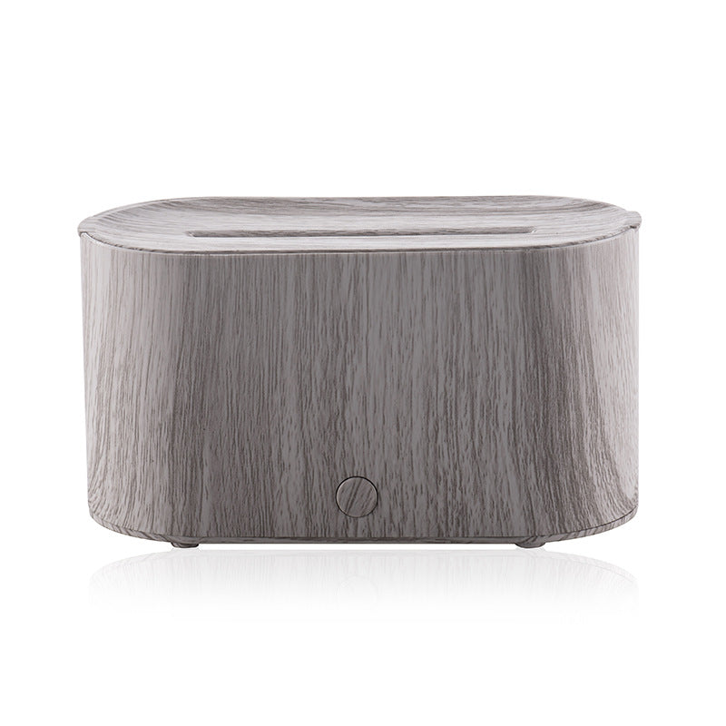 Gray ice crack humidifier with round body, top slot, and small power button on front