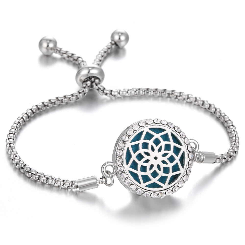 Silver Tree of Life aroma bracelet with blue medallion center and crystal bezel